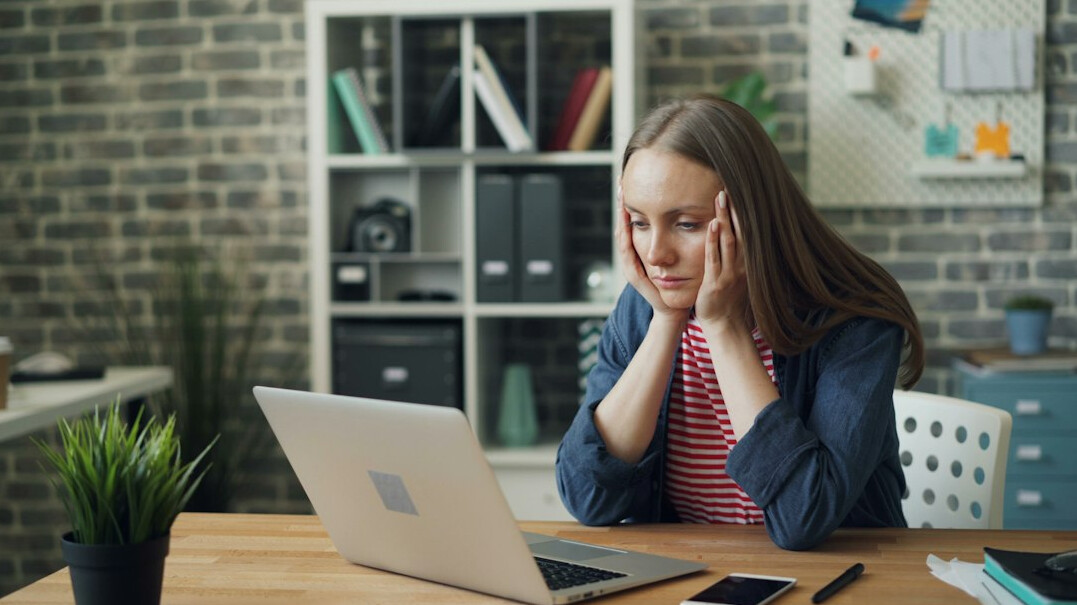 stressed employee at desk