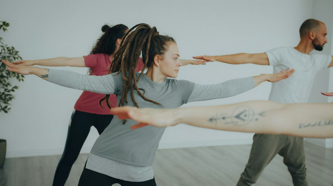 office workers stretching during break